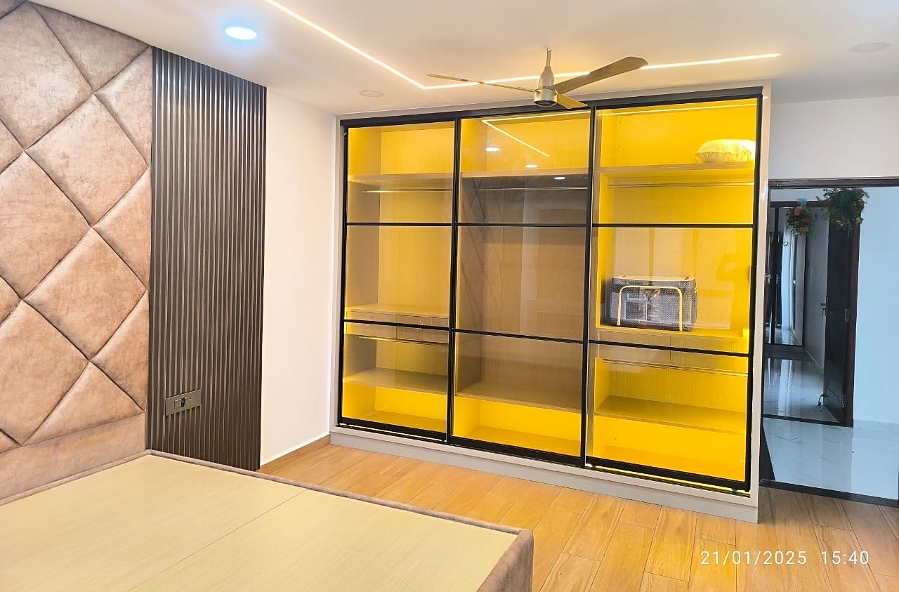 Wardrobe with yellow LED lighting